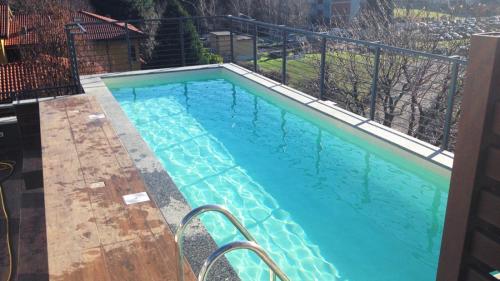Piscina in cemento armato in attico, rivestimento in PVC - Carate Brianza (MB)