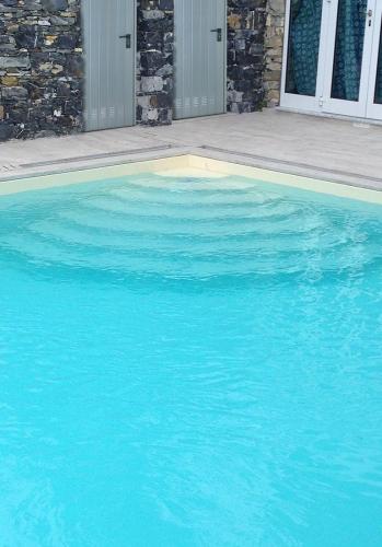 Piscina in cemento armato, rivestimento in PVC - Santa Margherita Ligure (GE)